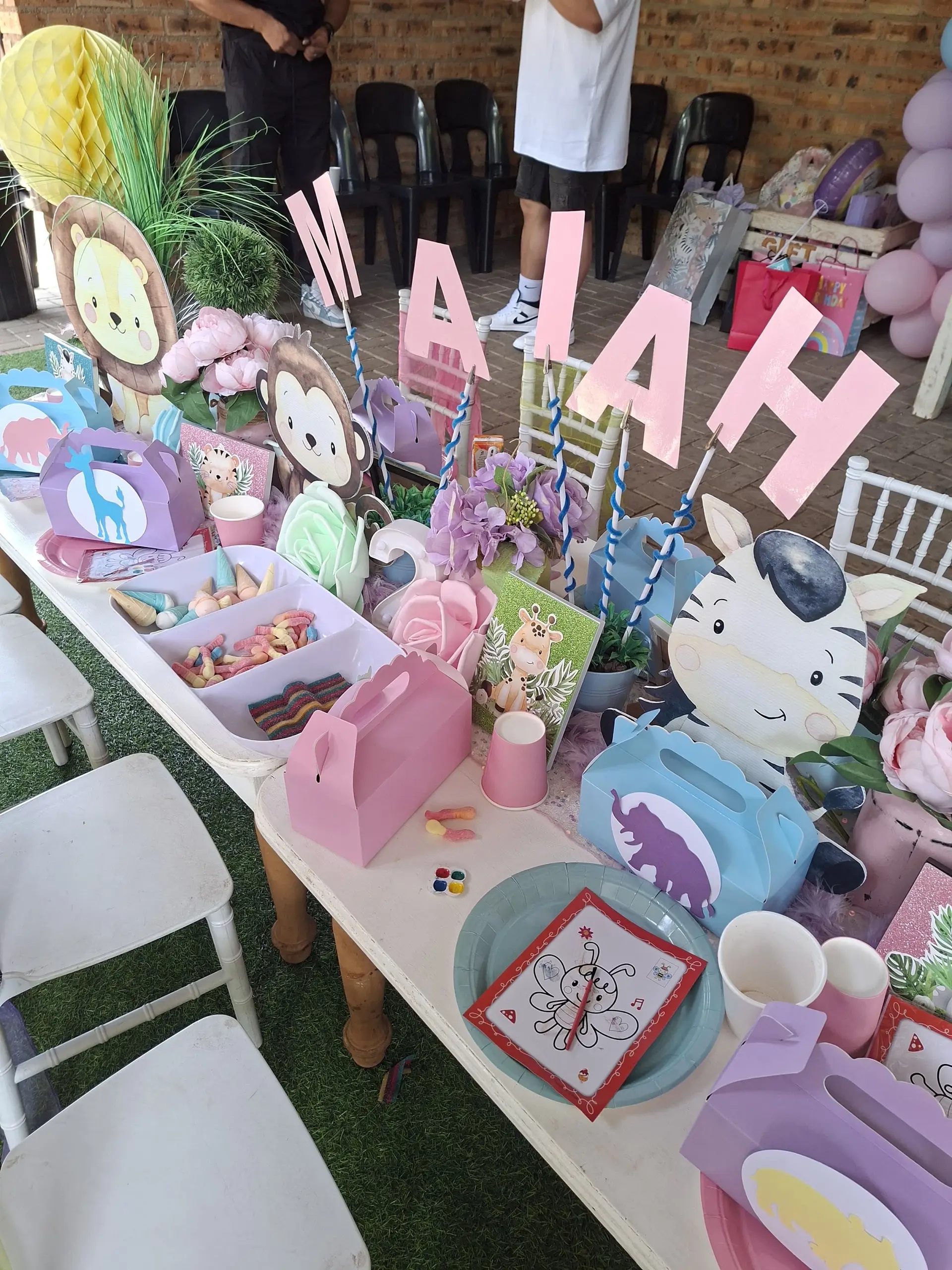A rainbow table with tiny chairs
